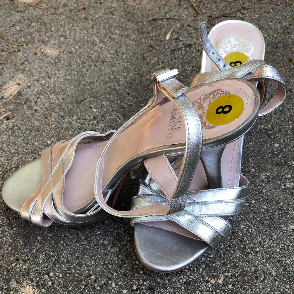 Silver platform high heeled shoes